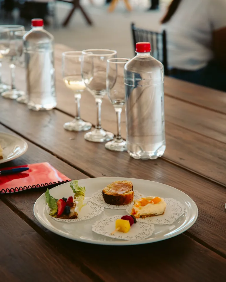 Outdoor table styled with gourmet appetizers