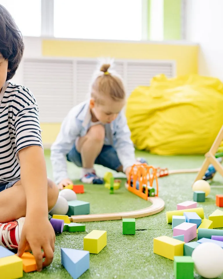 Cheerful kids playroom with toy storage and bright colors