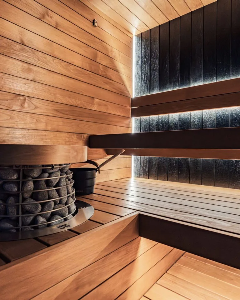 Wooden home sauna interior with benches