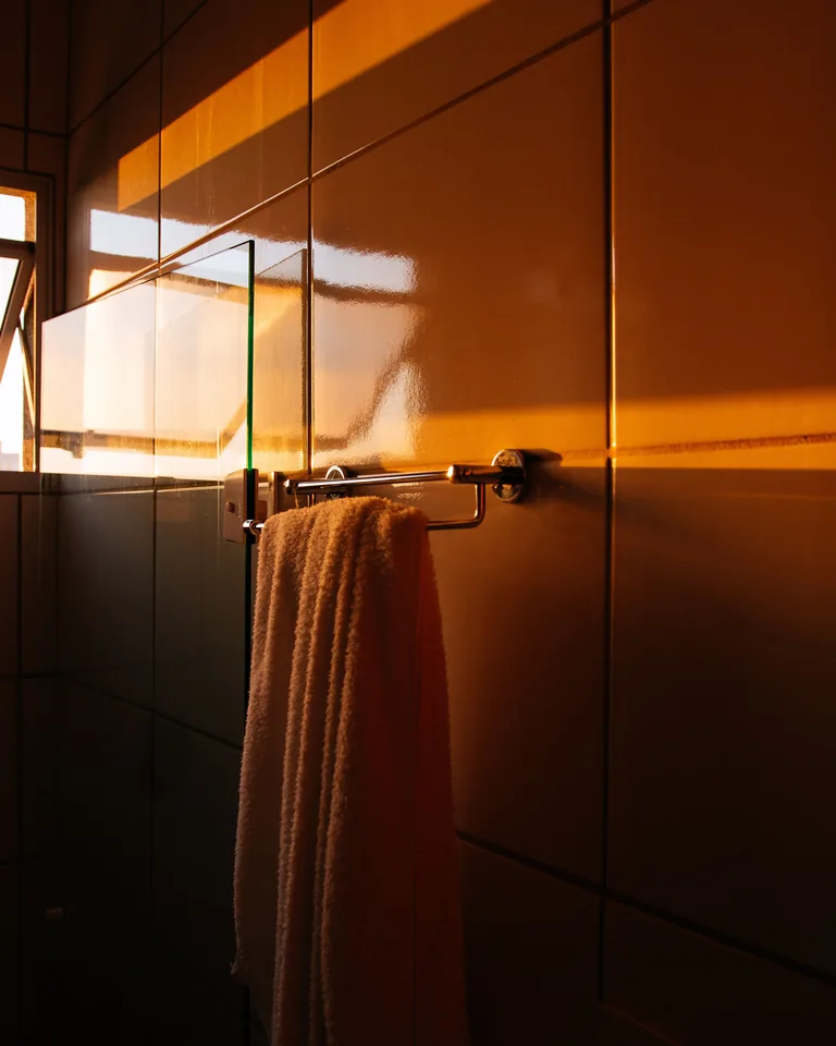 White towel hanging full length to dry
