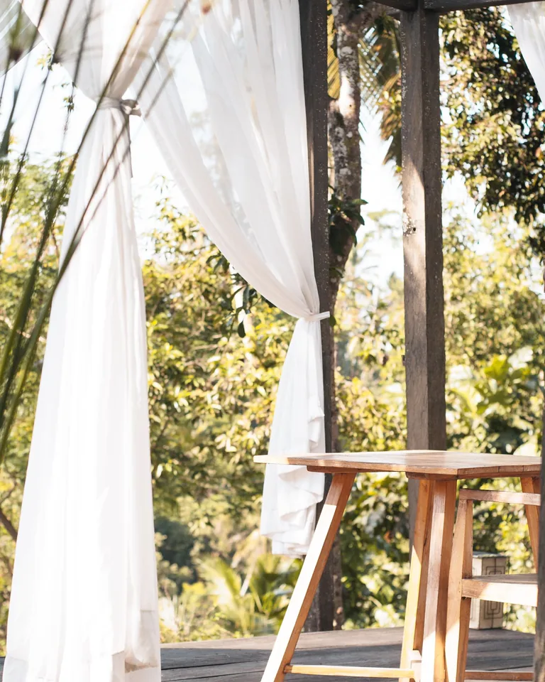 Sheer outdoor curtains on a patio