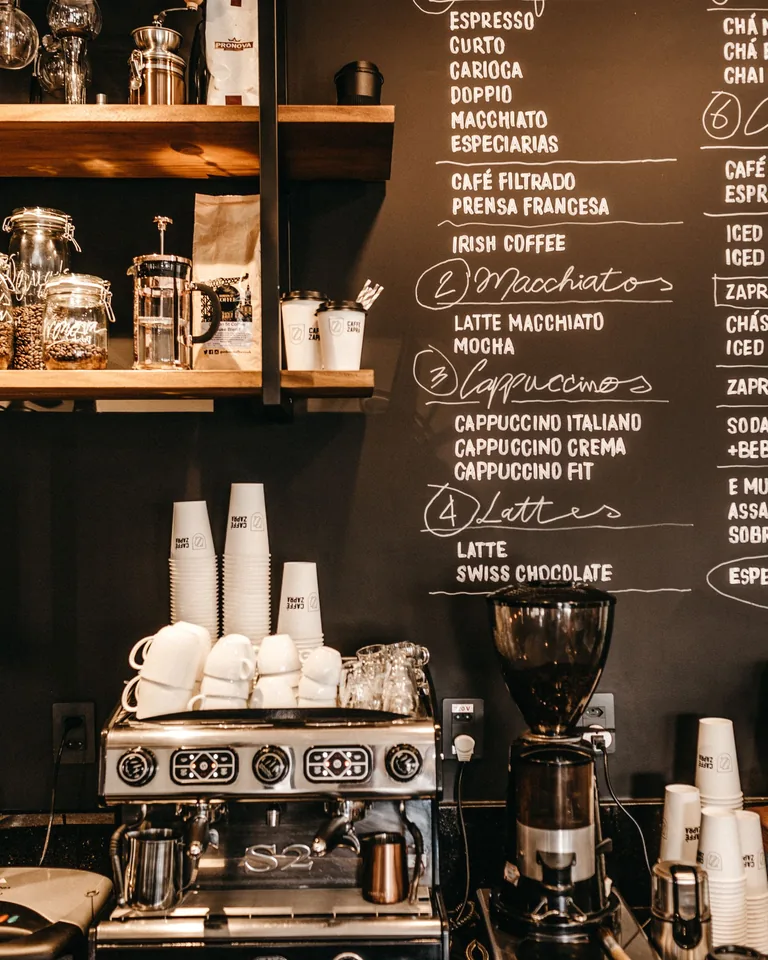 Rolling bar cart styled as a coffee station
