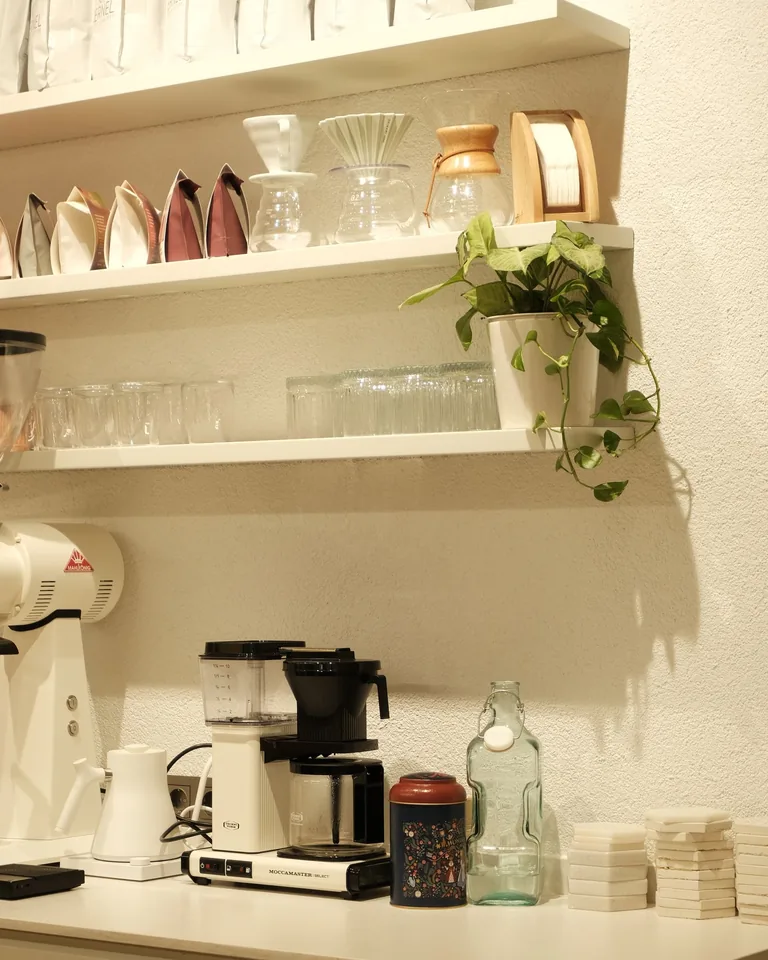 Coffee corner with floating shelves above the counter