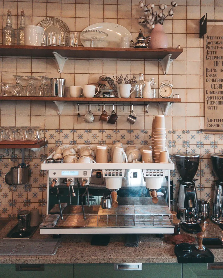 Coffee nook arranged inside a kitchen cabinet area