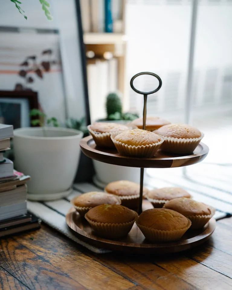Tiered tray styled with coffee cups and decor