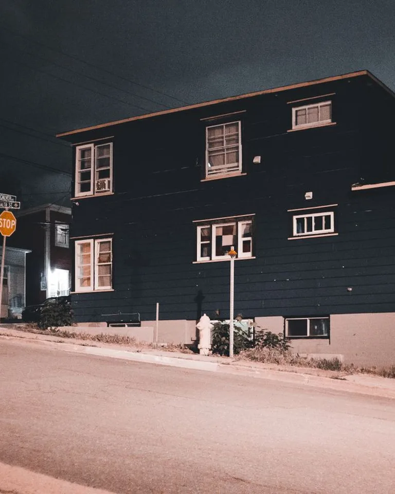 House lit up at night during Halloween season