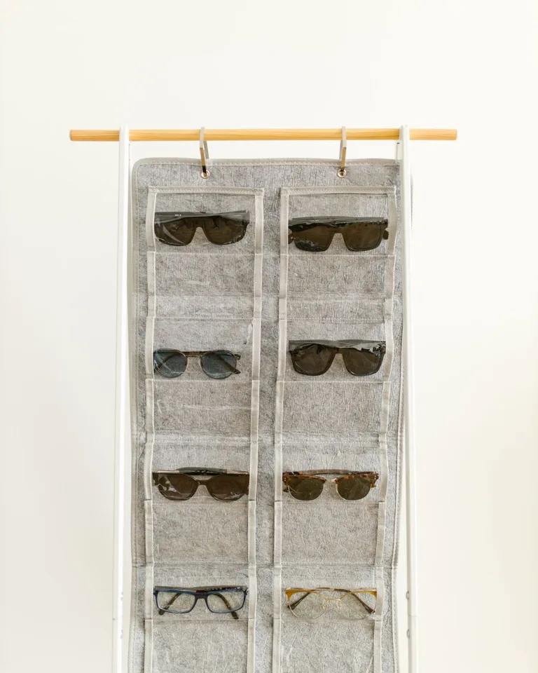 Hanging organizer with pockets on the back of a door
