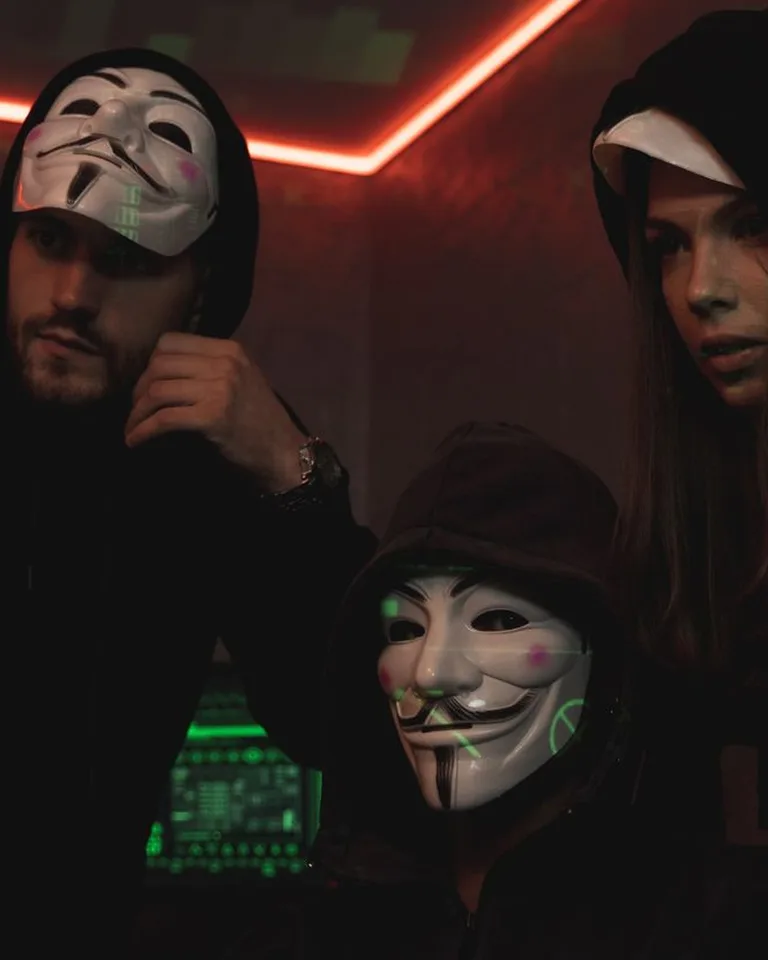 People wearing spooky masks for a Halloween scare