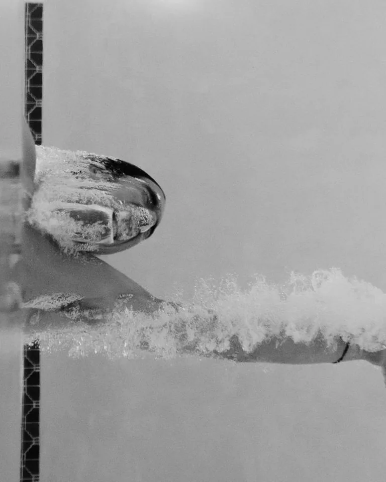 Pool steps with underwater tape in clear water