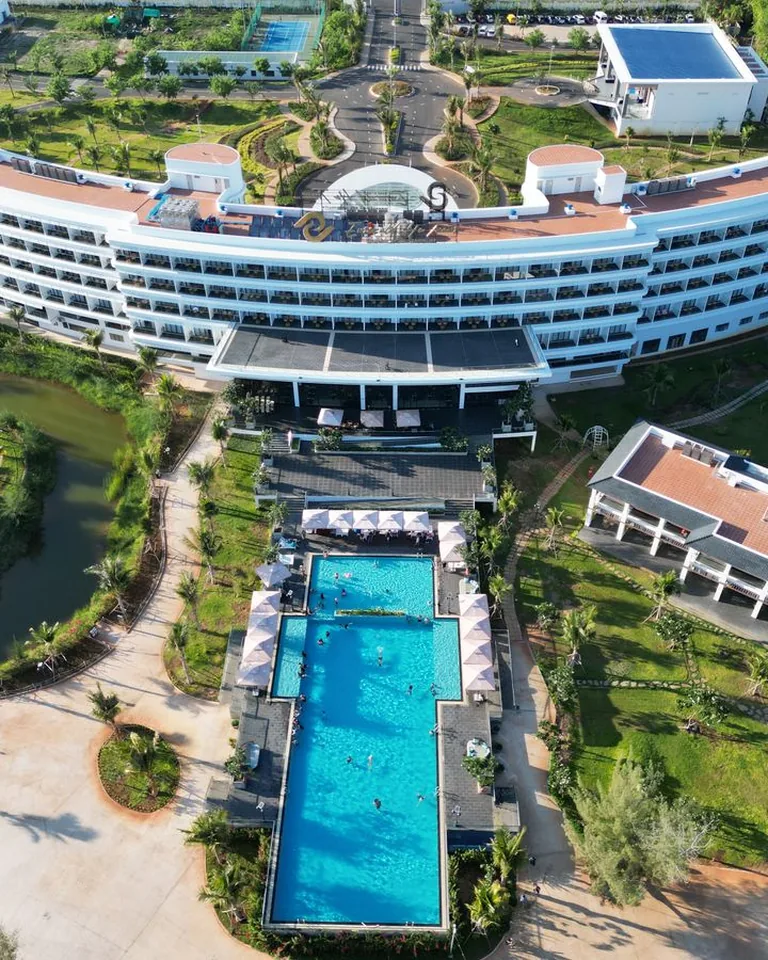 Aerial view of a luxury resort with swimming pool