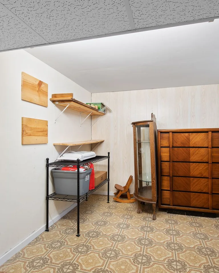 Cozy retro basement with wooden furniture and storage shelves