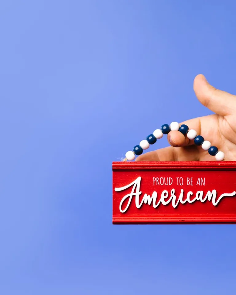 Patriotic sign against a blue background