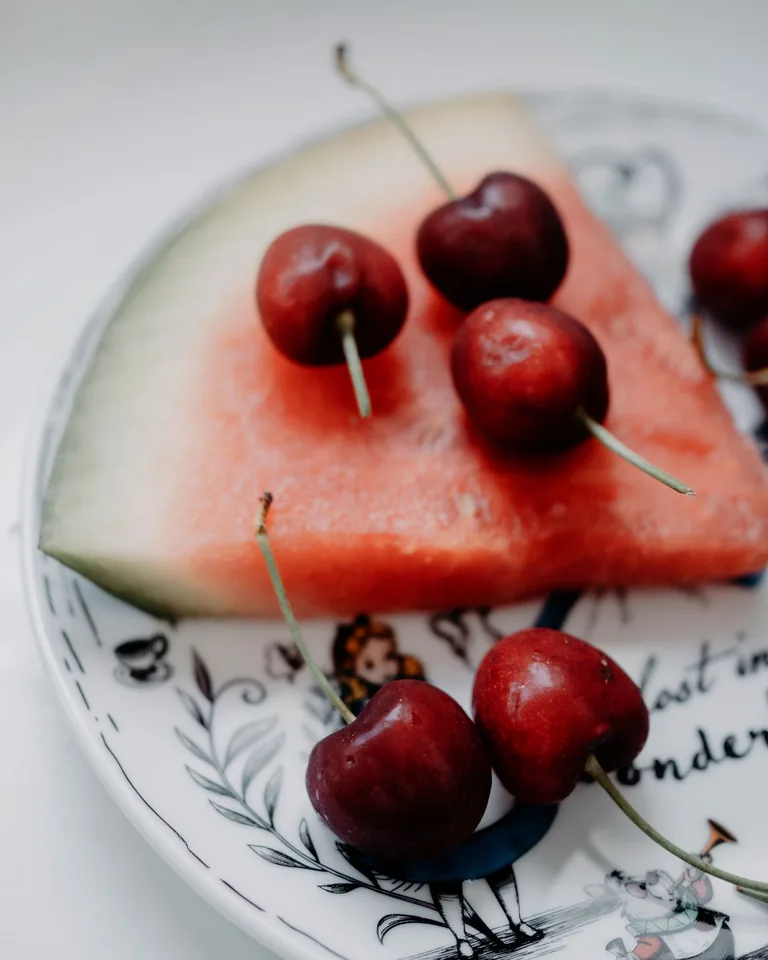 Plate of cherries and watermelon slices